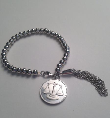 supply justice introduces a scales of justice sterling bracelet for gift giving
