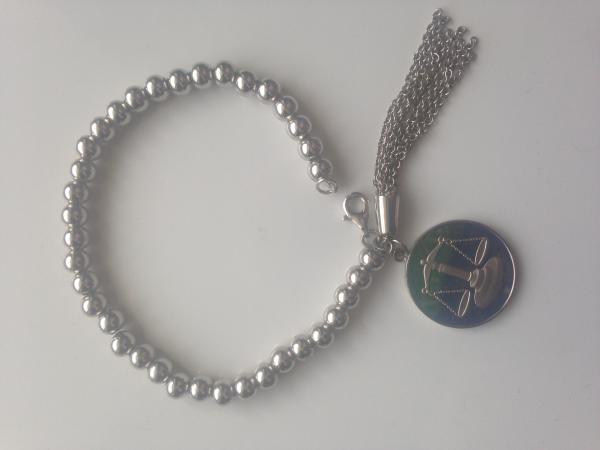 supply justice introduces a scales of justice sterling bracelet for gift giving